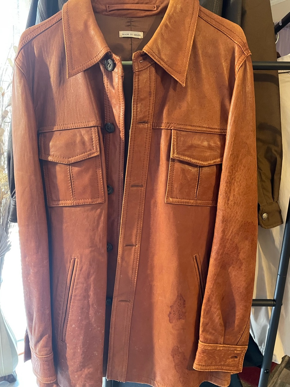 Leather jacket interior label of a Casadesport clothing item, likely a vintage